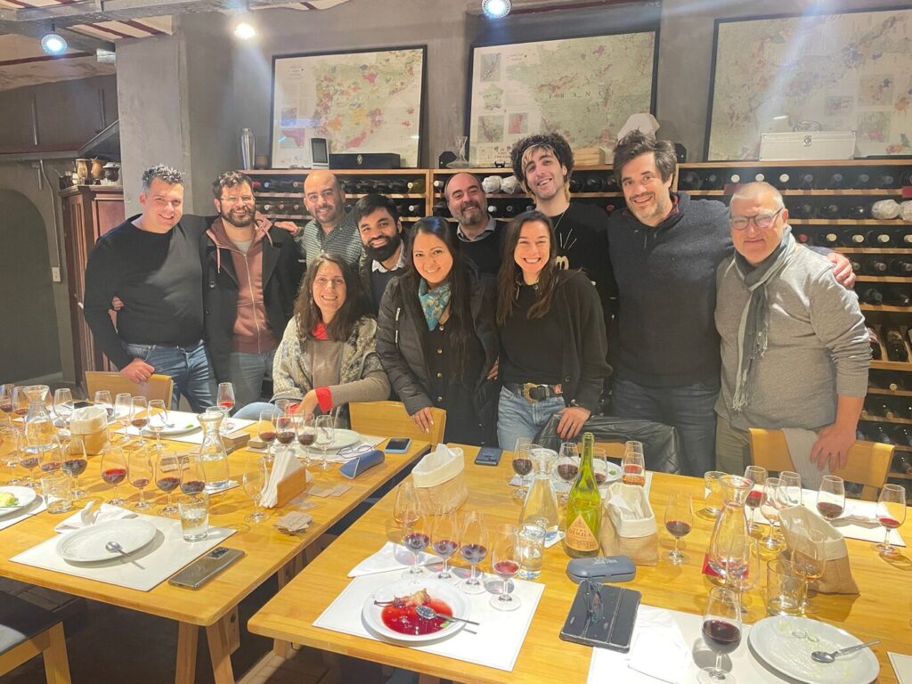Spyrosoft team in Argentina posing together during a celebratory dinner.
