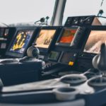 a cover photo for the article about Marine HMI: Designing Modern HMIs for Yachts with Qt and NMEA 2000 showing a rudder