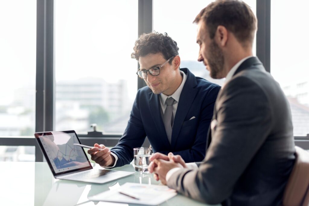 Financial Services. Financial consultants collaborating on financial data